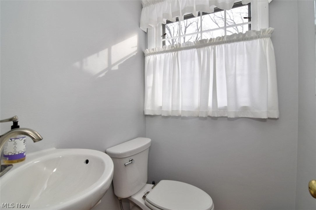 15991 Henley Road Cleveland, OH 44112 - Photo 13 of 36 Half bath first floor hallway