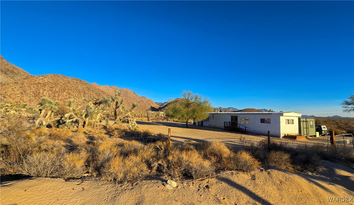 11948 Carrow Road Yucca, AZ 86438 - Photo 2 of 36 Front of Structure