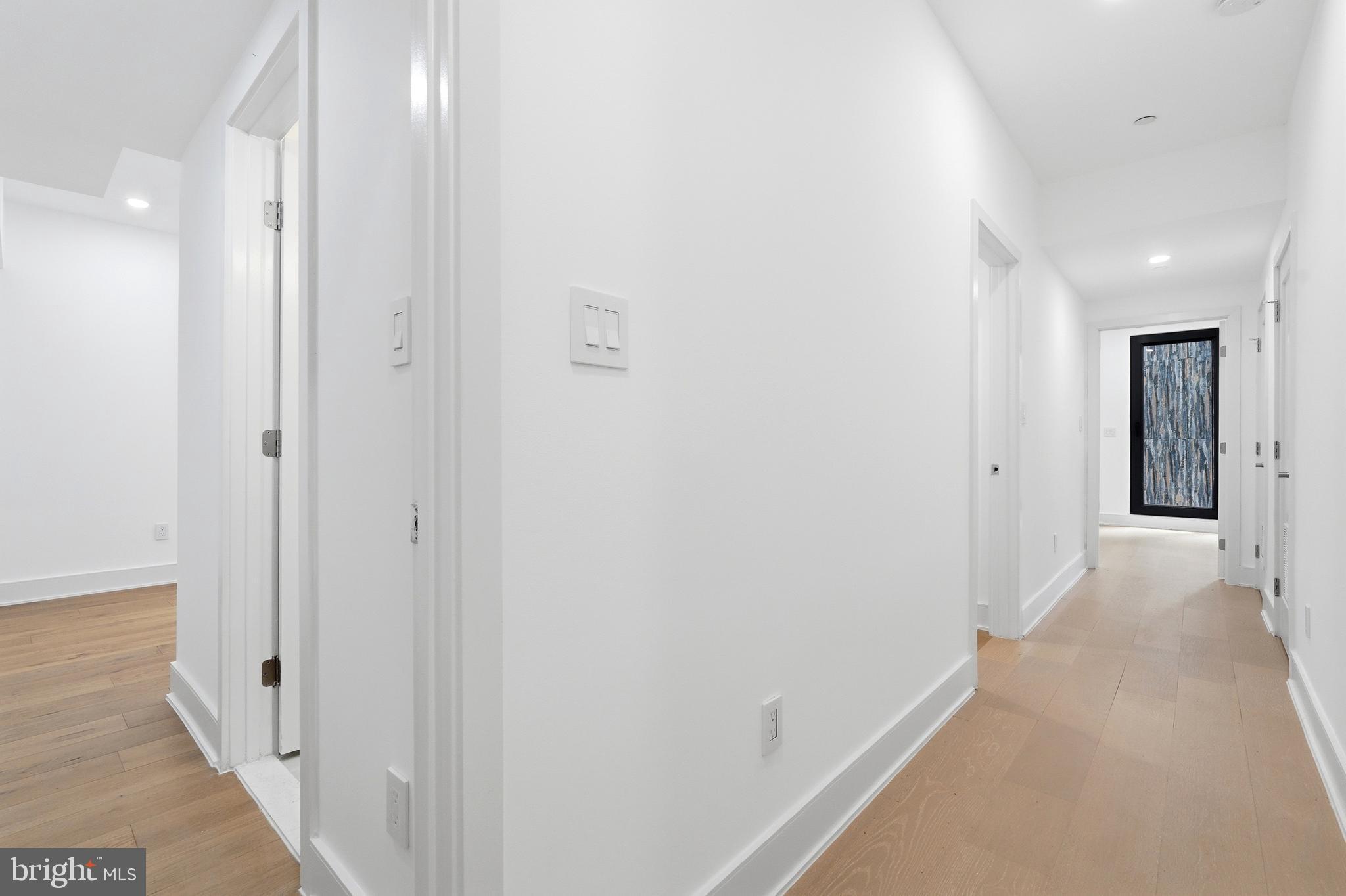 1810 Central Place Northeast, Unit 1 Washington, DC 20002 - Photo 19 of 36 a view of a hallway with wooden floor