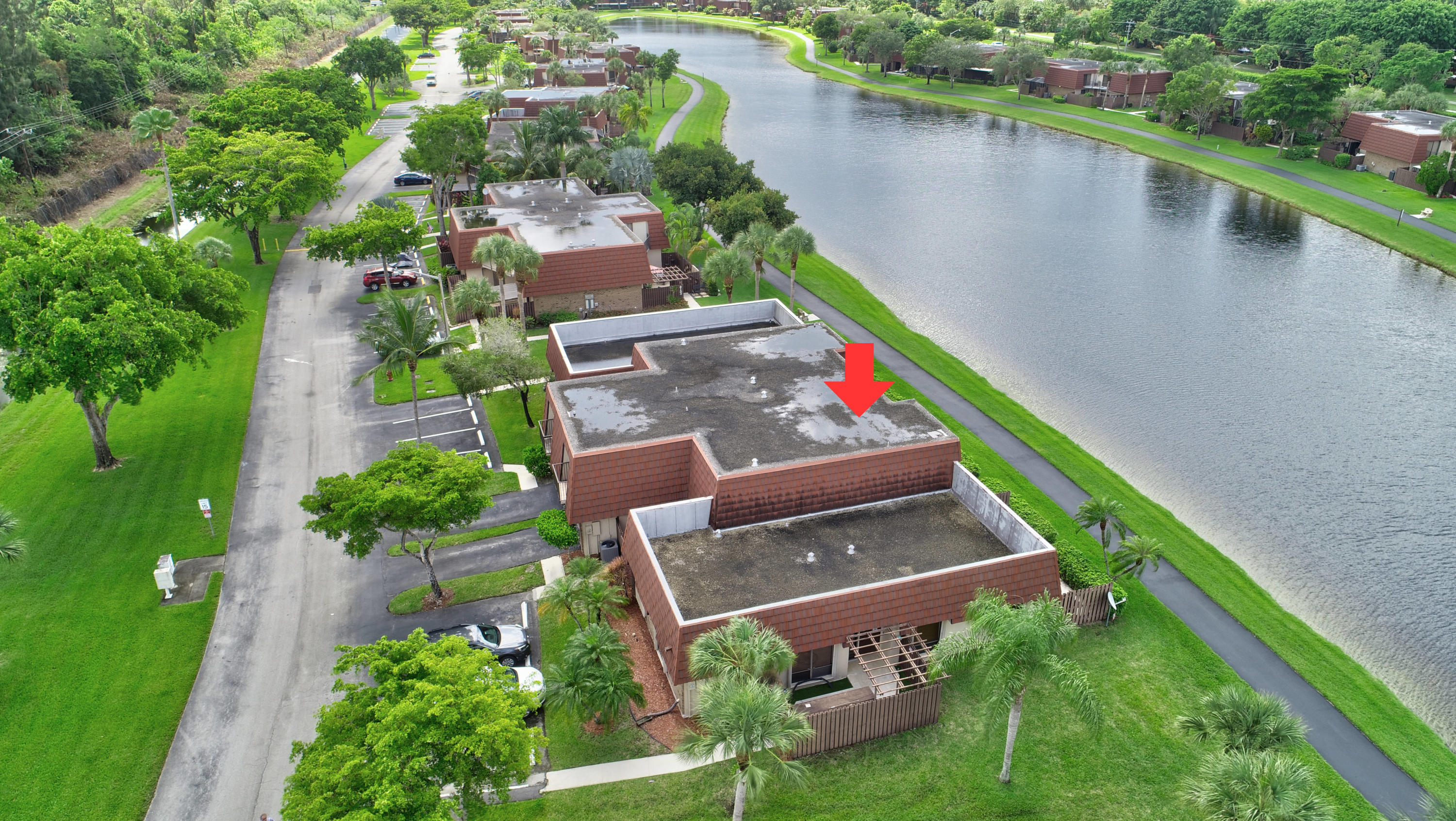 8165 Boca Rio Drive Boca Raton, FL 33433 - Photo 5 of 49 an aerial view of a house with a lake view