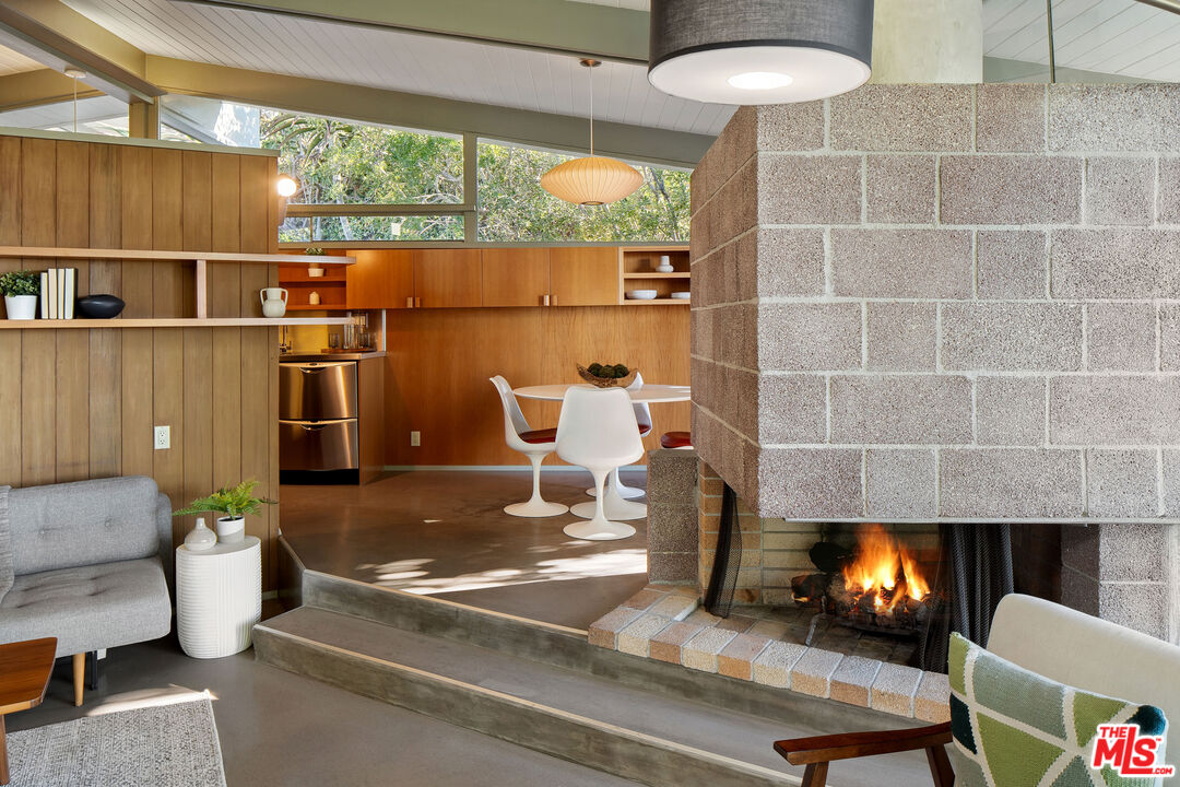 12412 Deerbrook Lane Los Angeles, CA 90049 - Photo 11 of 30 a room with furniture and a window