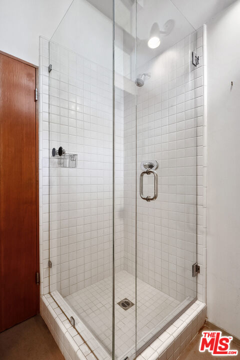 12412 Deerbrook Lane Los Angeles, CA 90049 - Photo 20 of 30 a bathroom with a shower