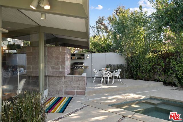 a view of a outdoor space with a patio