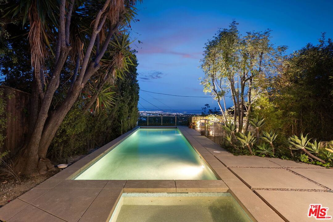 12412 Deerbrook Lane Los Angeles, CA 90049 - Photo 30 of 30 a view of a backyard of the house