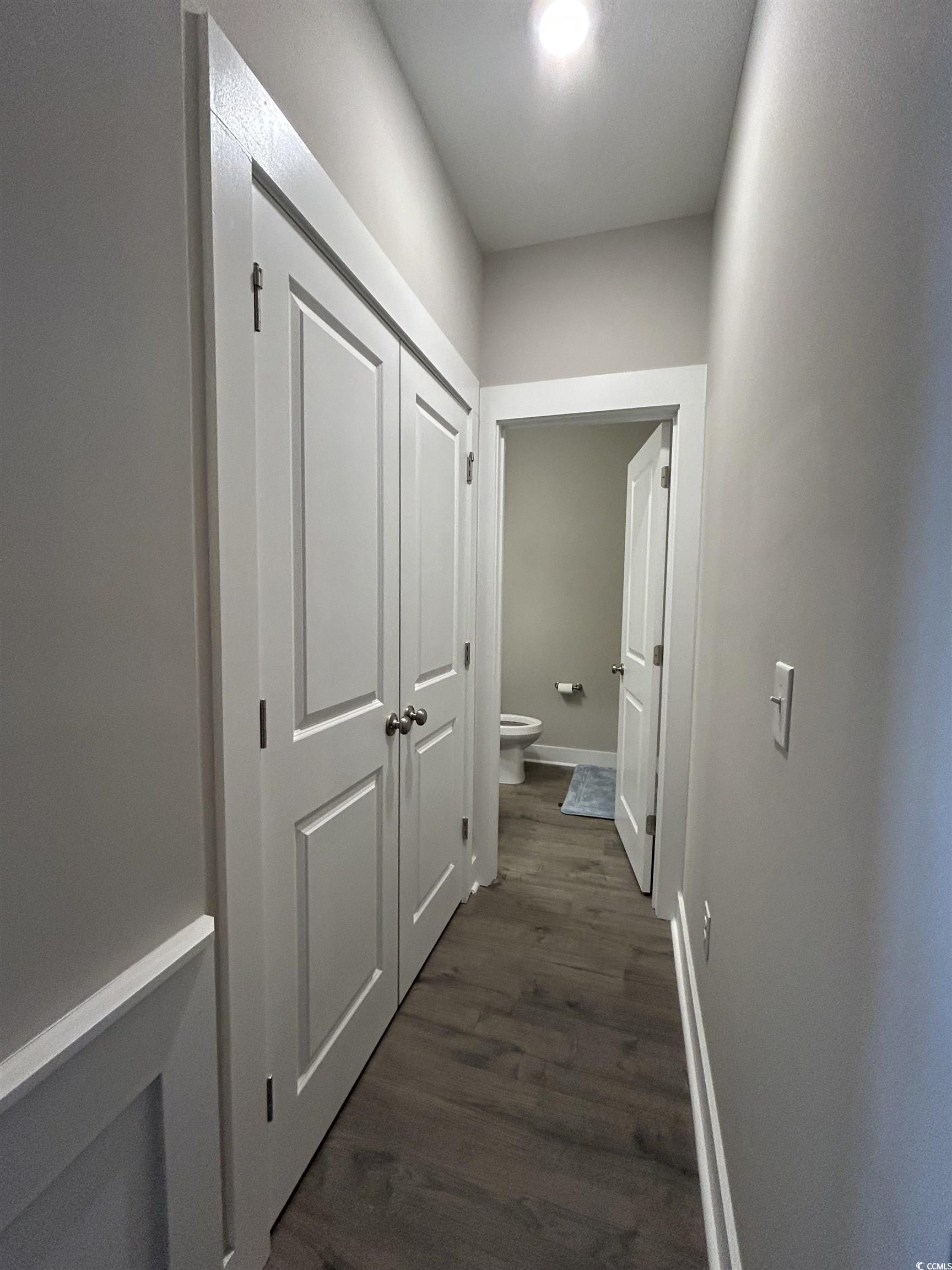 2108 Ballast Court Myrtle Beach, SC 29579 - Photo 15 of 37 Hall featuring dark wood-type flooring and baseboards