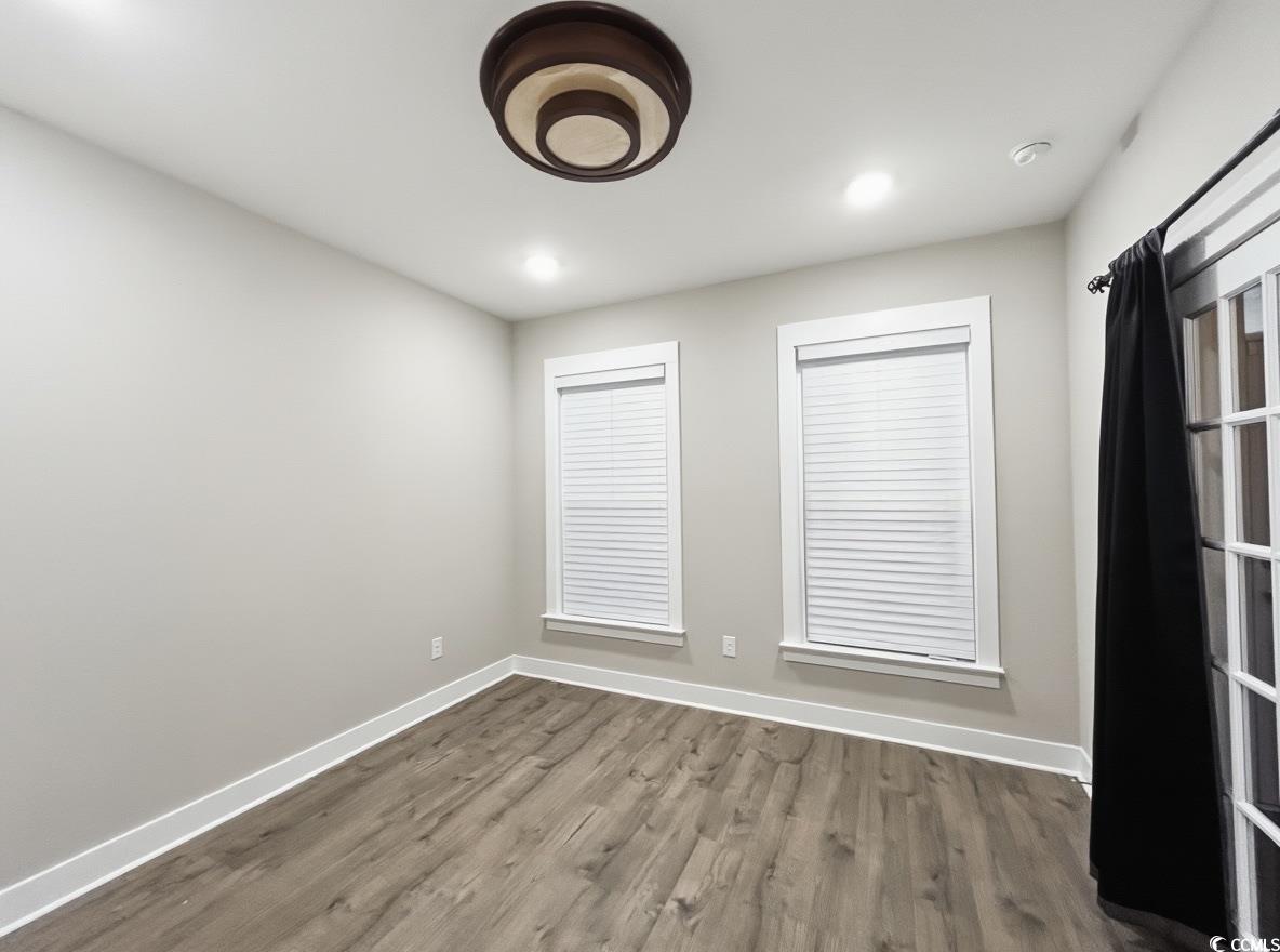 2108 Ballast Court Myrtle Beach, SC 29579 - Photo 23 of 37 Spare room featuring wood finished floors and recessed lighting