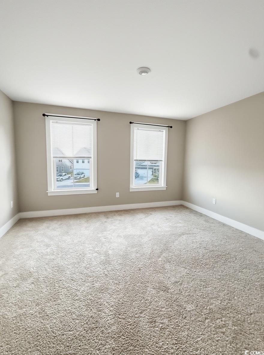 2108 Ballast Court Myrtle Beach, SC 29579 - Photo 31 of 37 Spare room with carpet flooring and baseboards