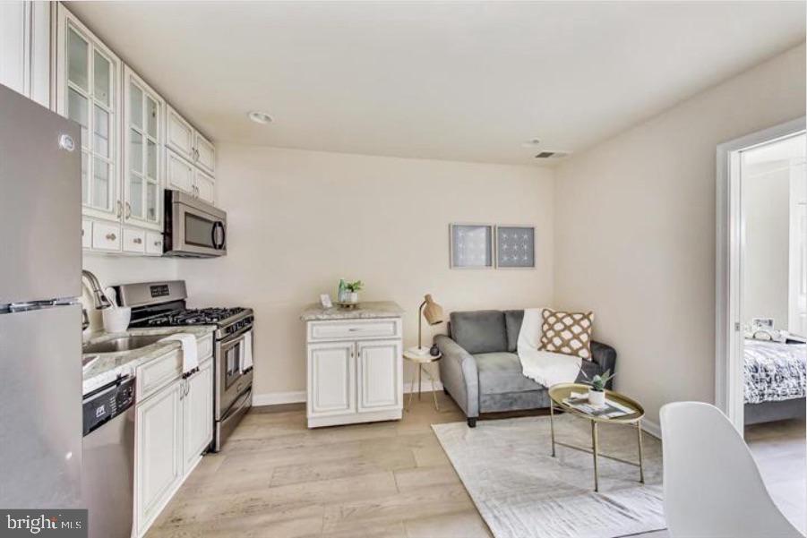 Charming kitchen with modern flair.