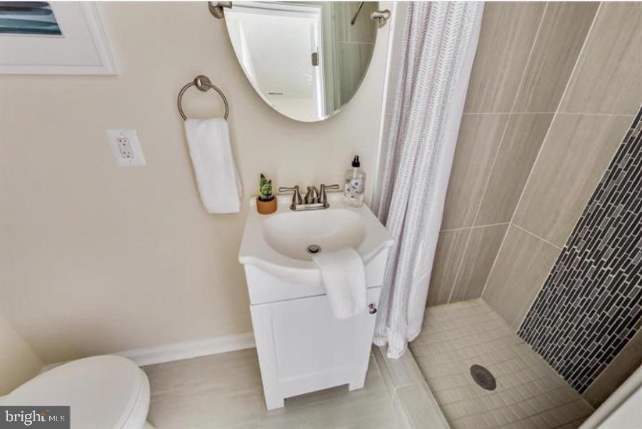 1720 H Street Northeast, Unit B Washington, DC 20002 - Photo 13 of 29 Chic bathroom with modern elegance.