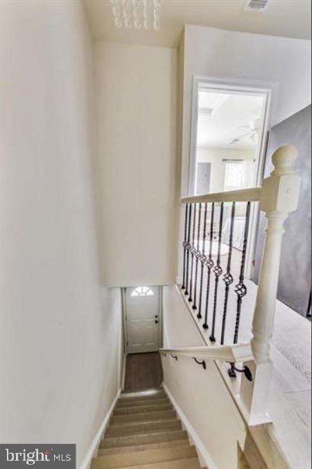 1720 H Street Northeast, Unit B Washington, DC 20002 - Photo 2 of 29 Inviting staircase to a bright entryway.