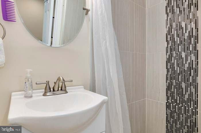 1720 H Street Northeast, Unit B Washington, DC 20002 - Photo 27 of 29 Modern bathroom with sleek design.