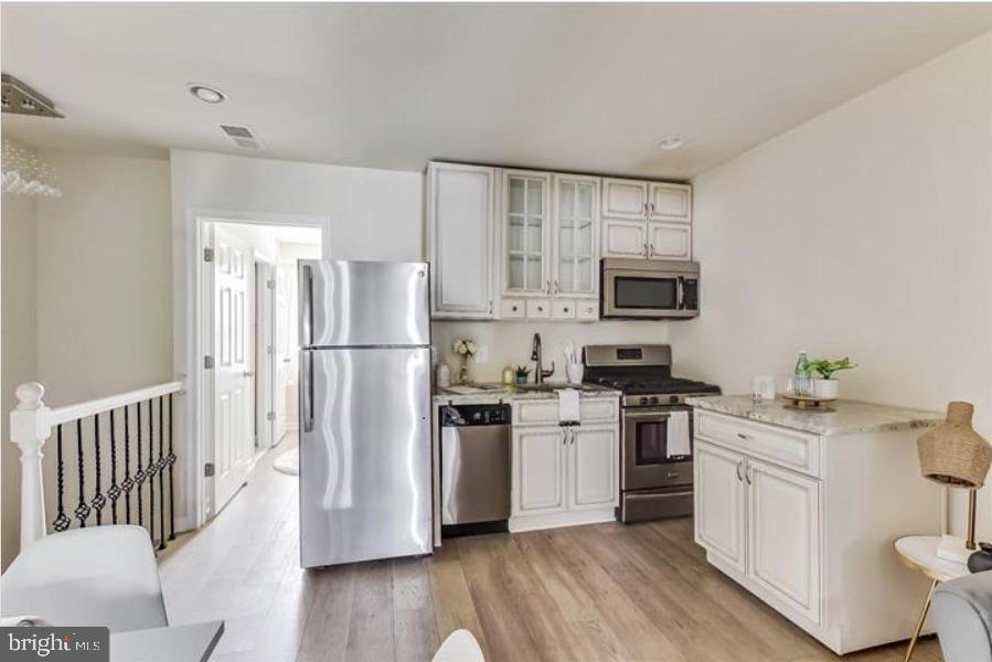 1720 H Street Northeast, Unit B Washington, DC 20002 - Photo 5 of 29 Charming kitchen with modern finishes.