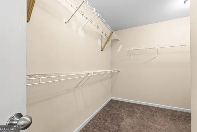 a view of a room with racks on the wall