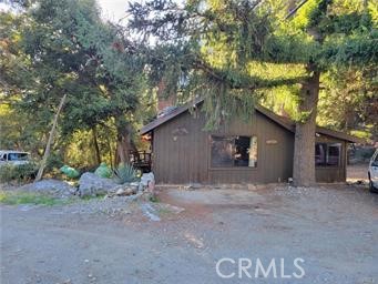 3 Glacier Mount Baldy, CA 91759 - Photo 38 of 49 a house with trees in the background