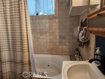 3 Glacier Mount Baldy, CA 91759 - Photo 41 of 49 a bathroom with a sink a toilet and shower