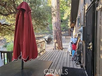 3 Glacier Mount Baldy, CA 91759 - Photo 48 of 49 a view of a balcony with furniture and wooden deck