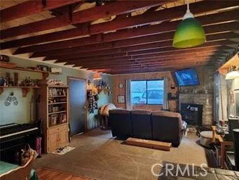a view of livingroom with furniture and a ceiling fan