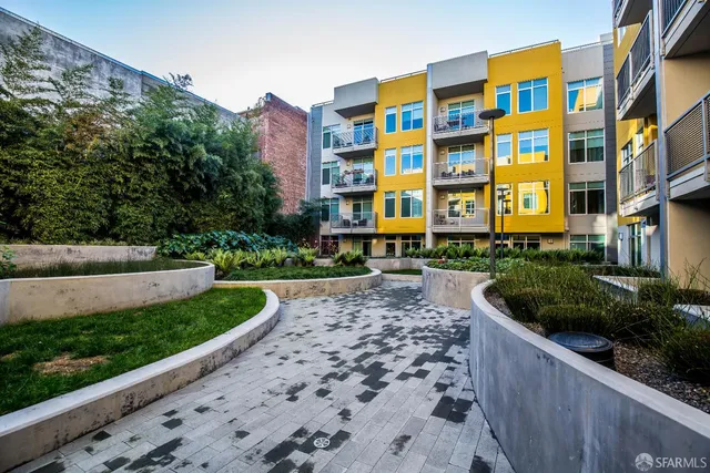 a view of a livingroom with furniture and window