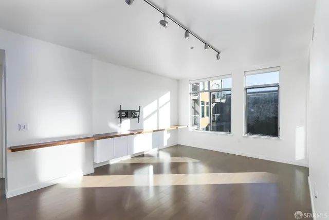 a view of a kitchen with kitchen area and windows
