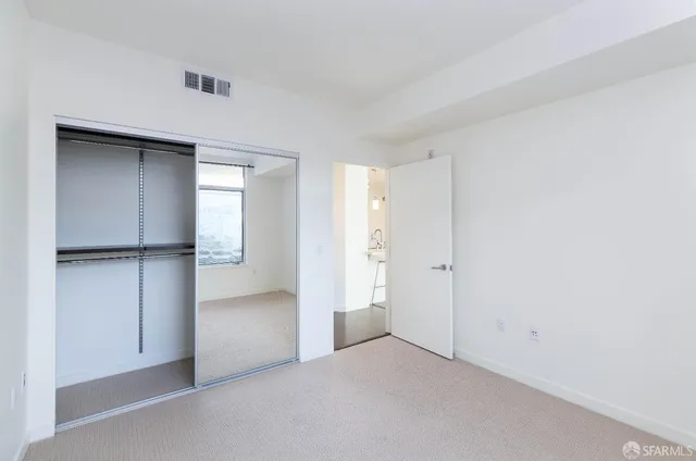 an empty room with closet