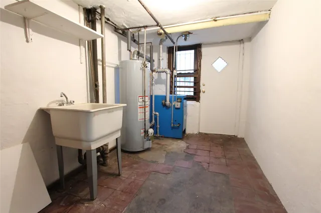 a view of a hallway with seating area