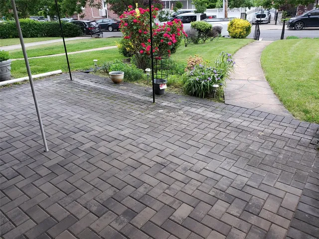 a view of a garden with potted plants