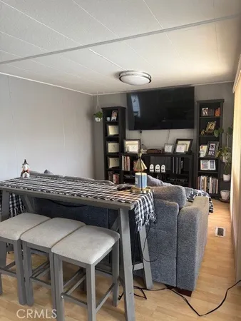 a living room with furniture and a table