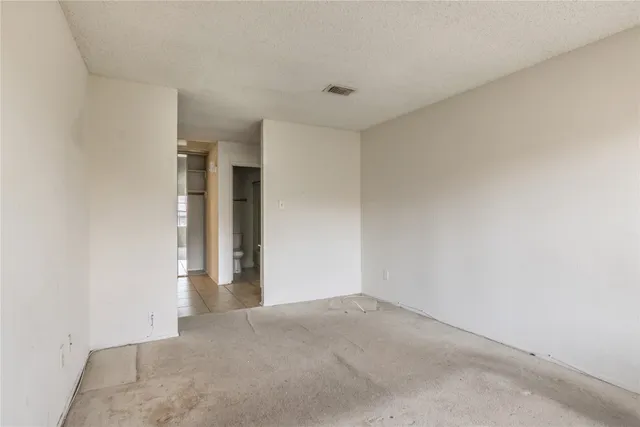 a view of a room with an empty space