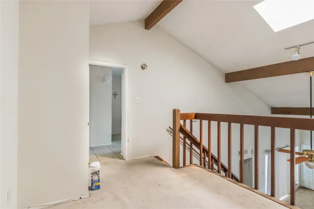 a view of a hallway with closet