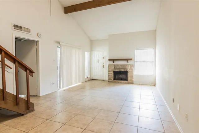 a view of a livingroom with a fireplace