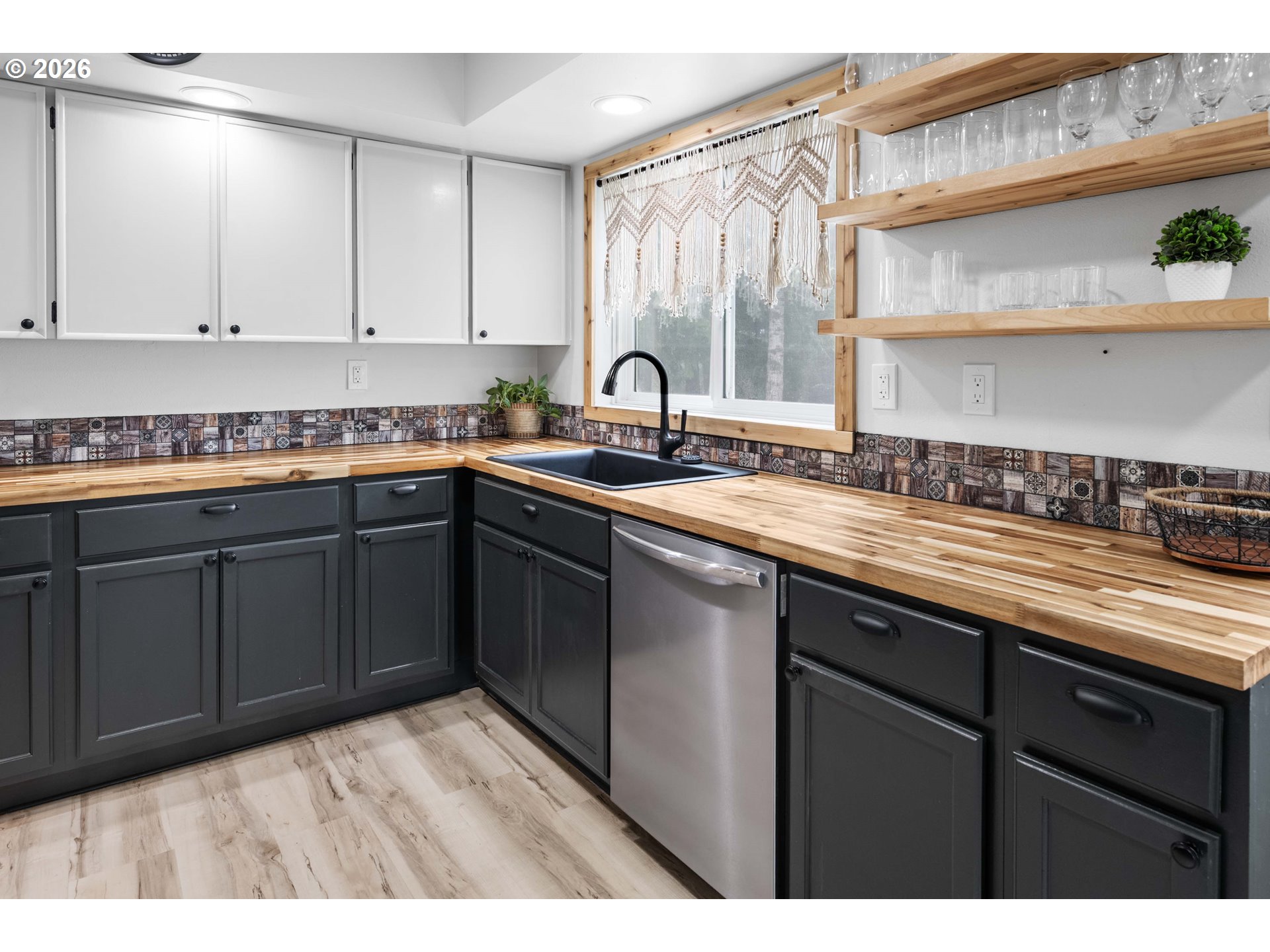 91614 George Hill Road Astoria, OR 97103 - Photo 11 of 44 a kitchen with a sink and cabinets