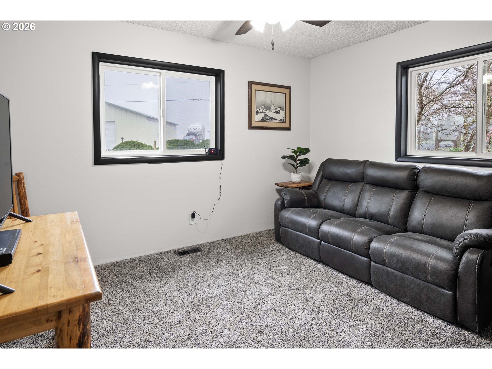 91614 George Hill Road Astoria, OR 97103 - Photo 23 of 44 a living room with furniture and a window