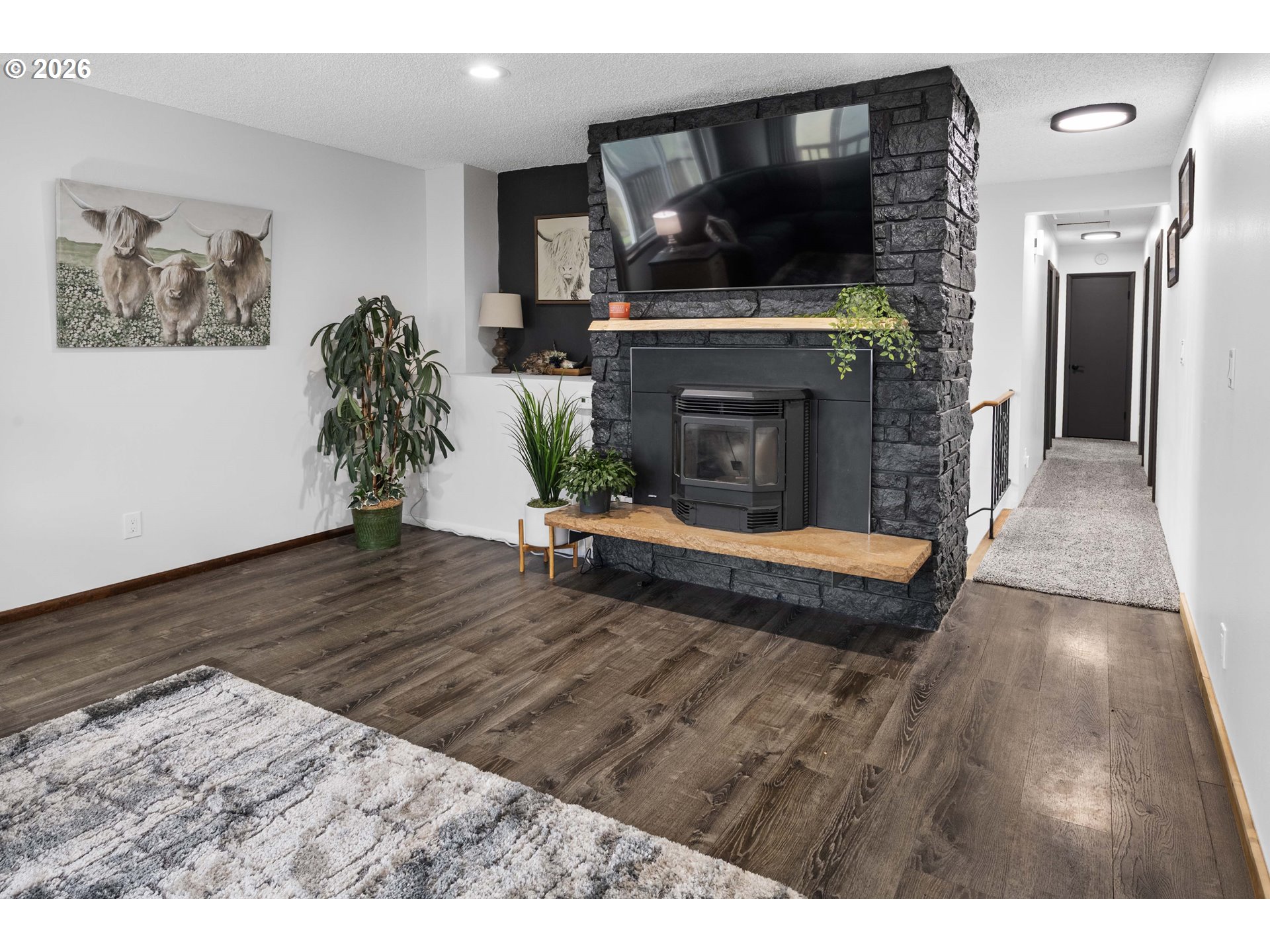 91614 George Hill Road Astoria, OR 97103 - Photo 3 of 44 a living room with furniture and a fireplace