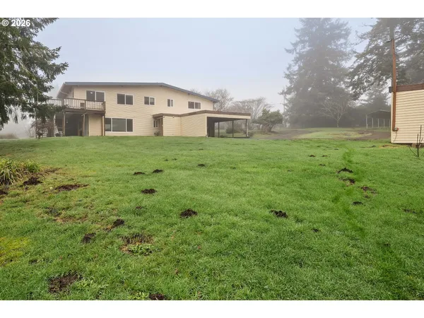 a view of building with yard