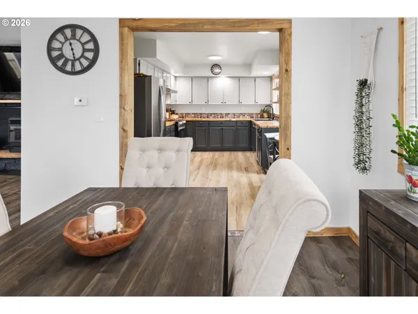 a view of kitchen with cabinets and wooden floor
