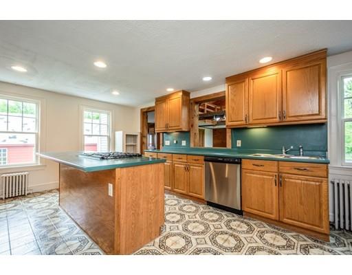 906 Williamsville Road Barre, MA 01005 - Photo 8 of 31 a kitchen with stainless steel appliances granite countertop a stove a sink and a refrigerator