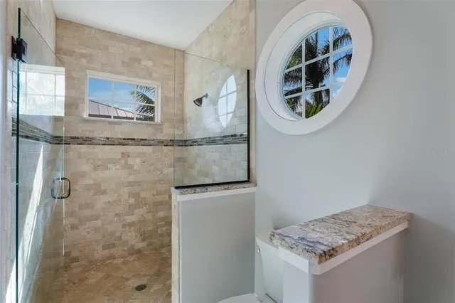 a bedroom with a bed and a cabinets