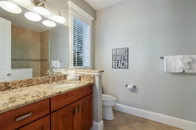 a view of a swimming pool with chairs