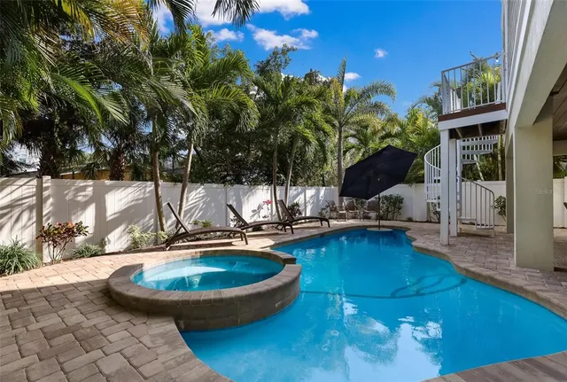 a view of a chairs and table on the terrace