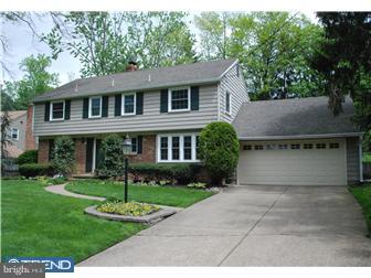 132 Pearl Croft Road Cherry Hill, NJ 08034 - Photo 1 of 12 a front view of a house with a yard and trees