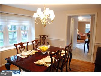 132 Pearl Croft Road Cherry Hill, NJ 08034 - Photo 3 of 12 a view of a dining room with furniture a chandelier and wooden floor