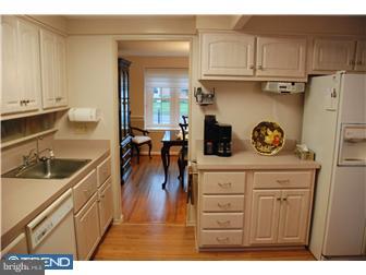 132 Pearl Croft Road Cherry Hill, NJ 08034 - Photo 5 of 12 a kitchen with appliances and cabinets