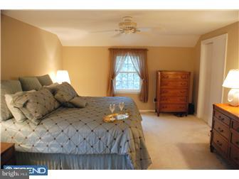 132 Pearl Croft Road Cherry Hill, NJ 08034 - Photo 7 of 12 a bedroom with a bed and a window