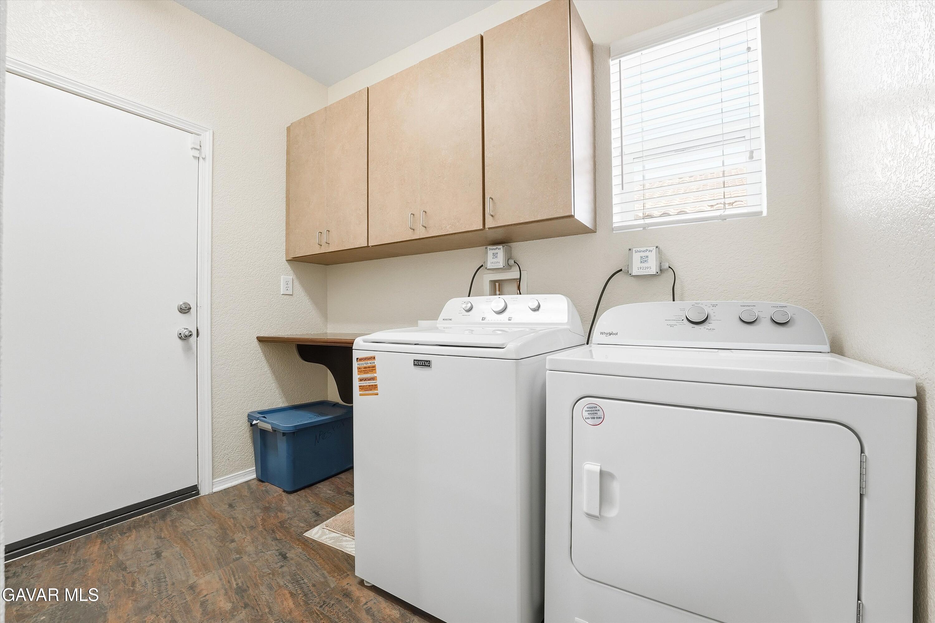 44232 Begonia Street Lancaster, CA 93535 - Photo 15 of 39 a utility room with dryer and washer