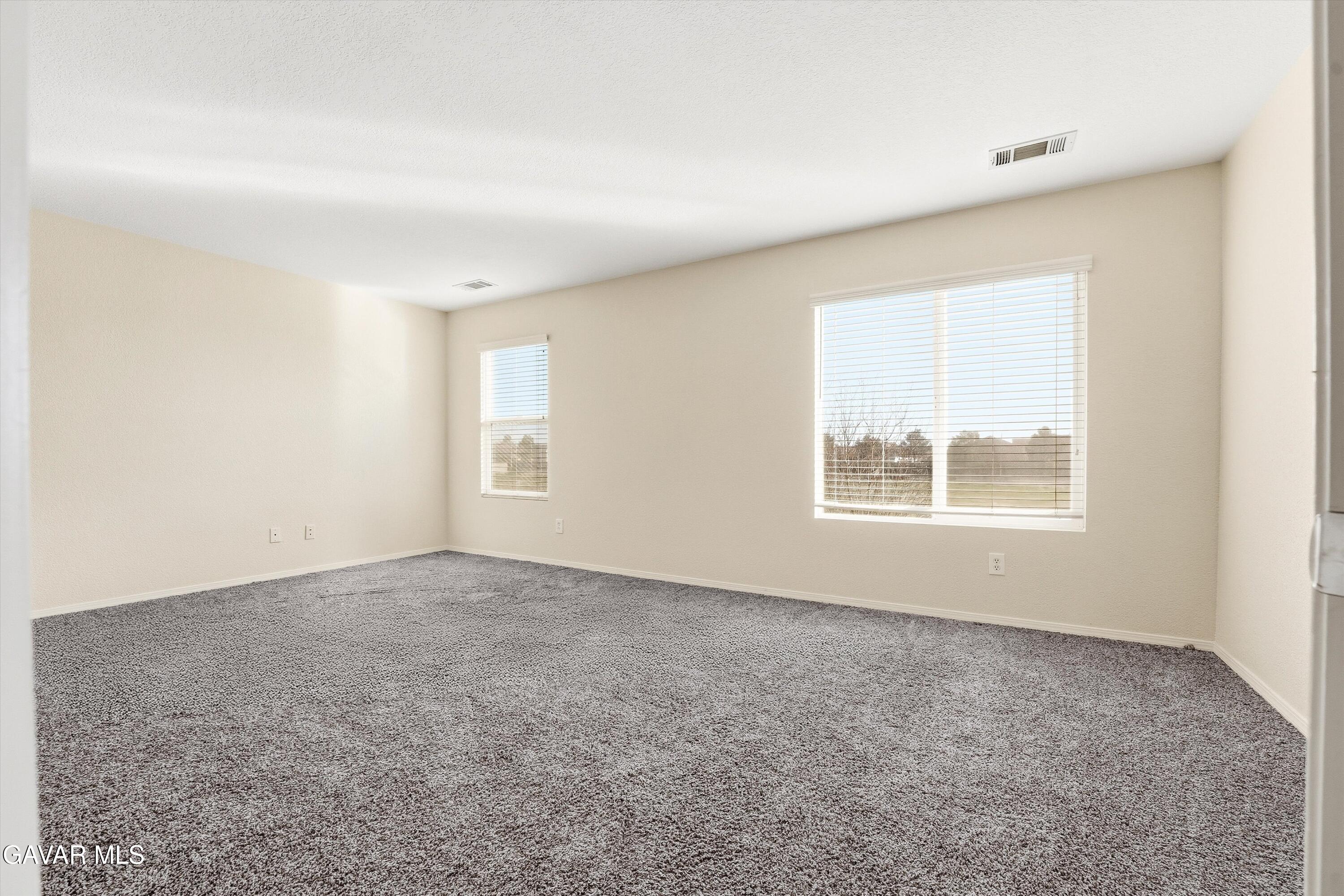 44232 Begonia Street Lancaster, CA 93535 - Photo 19 of 39 an empty room with a window