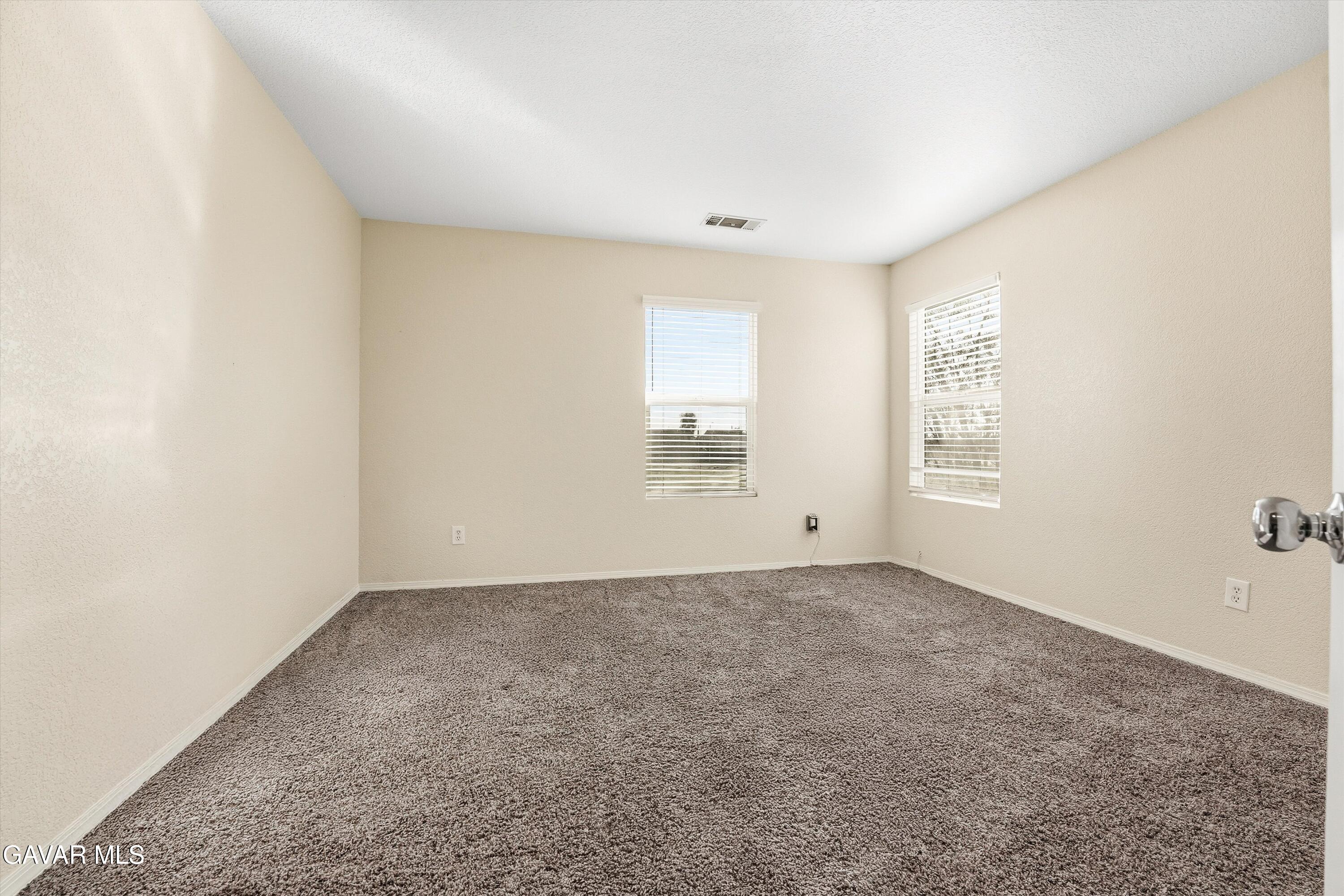 44232 Begonia Street Lancaster, CA 93535 - Photo 24 of 39 an empty room with a window