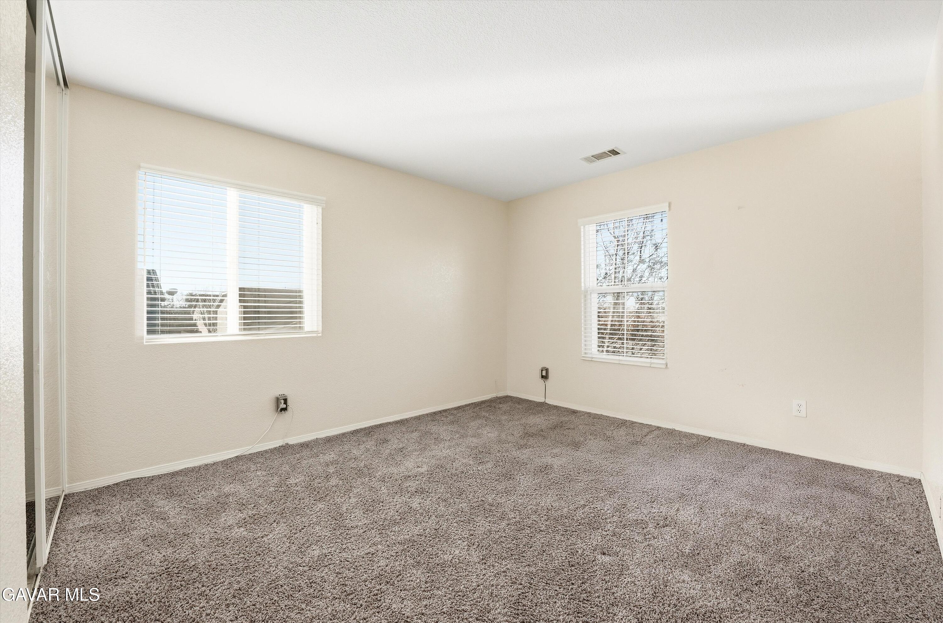 44232 Begonia Street Lancaster, CA 93535 - Photo 26 of 39 an empty room with windows