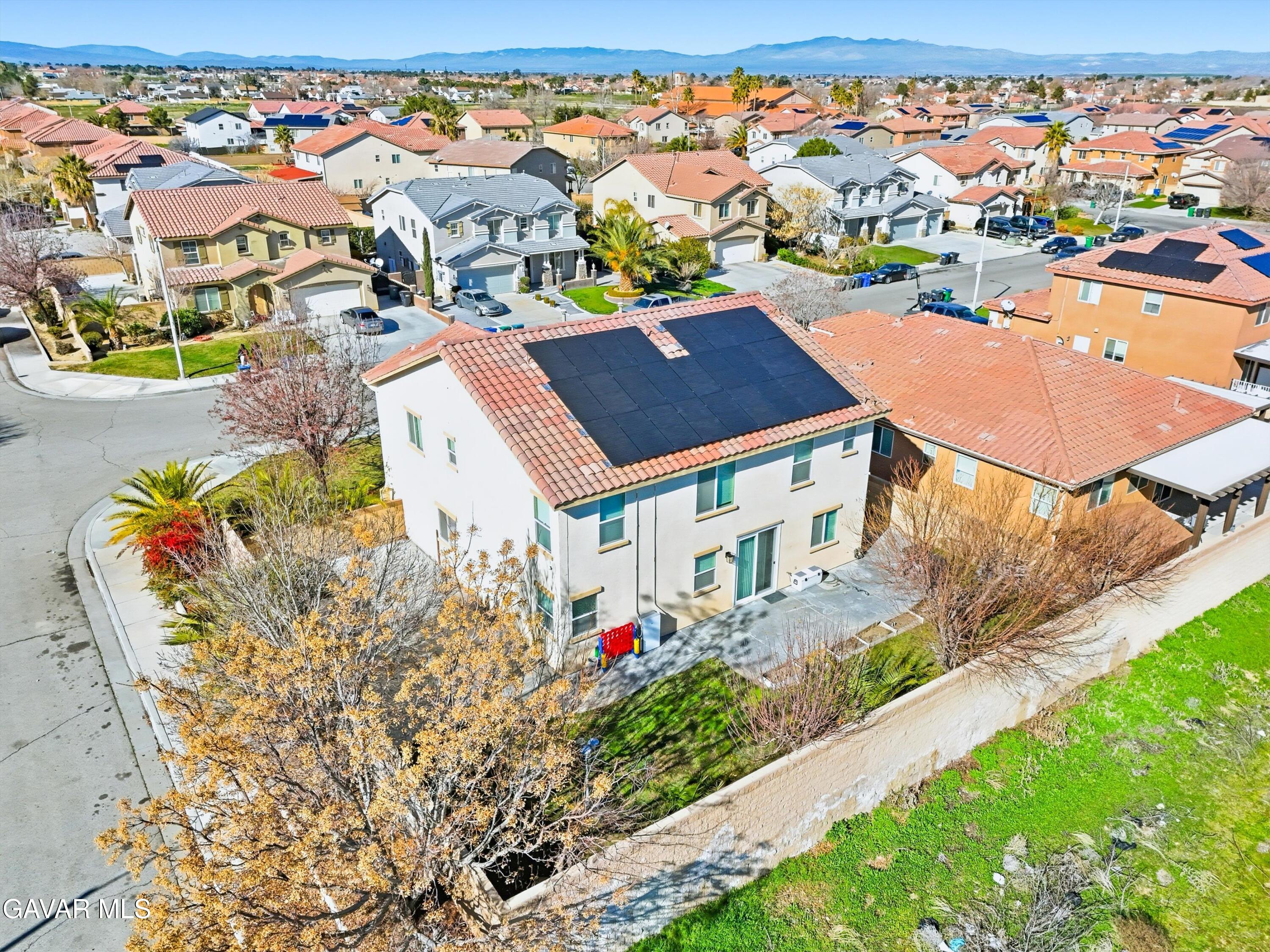 44232 Begonia Street Lancaster, CA 93535 - Photo 35 of 39 an aerial view of residential houses with outdoor space
