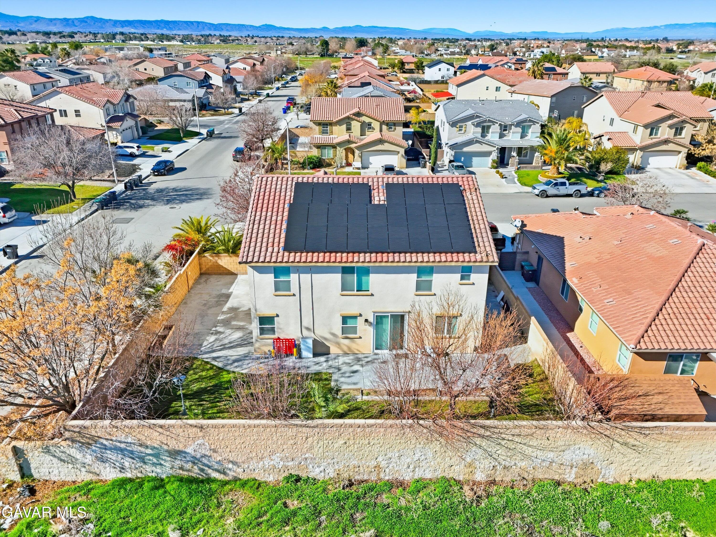 44232 Begonia Street Lancaster, CA 93535 - Photo 36 of 39 an aerial view of residential houses with outdoor space