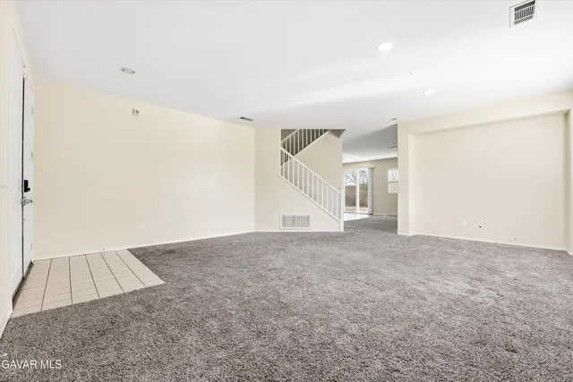 an empty room with a natural light